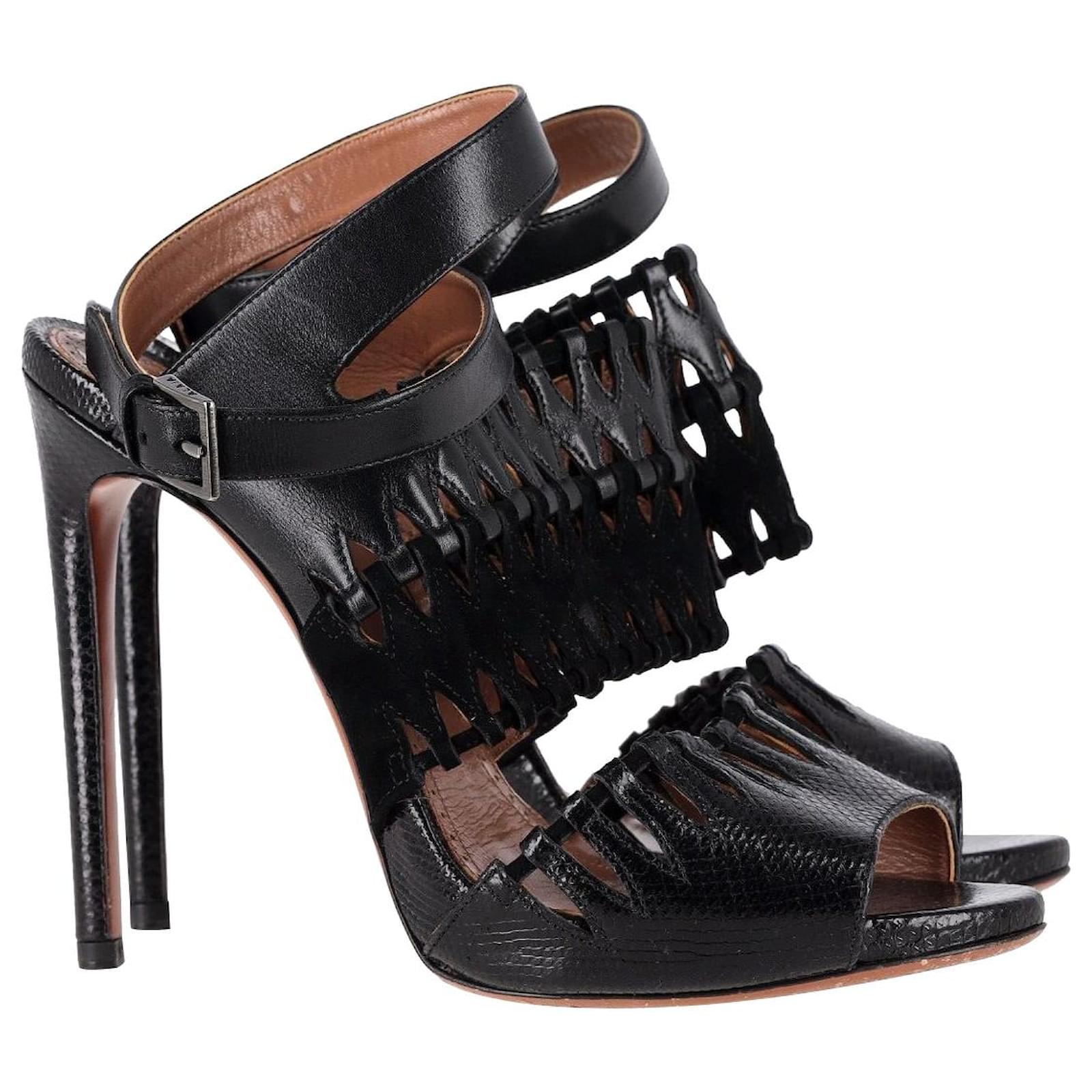 AlaÏa Cut Out Ankle-Strap Sandals in Black Leather  ref.1092157