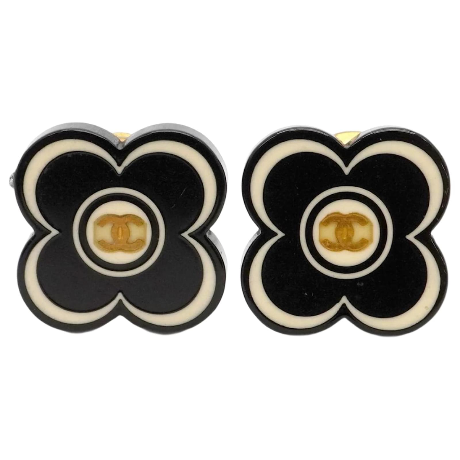 Chanel Clip Earrings in Black and Gold Golden Plastic Gold-plated  ref.2312820
