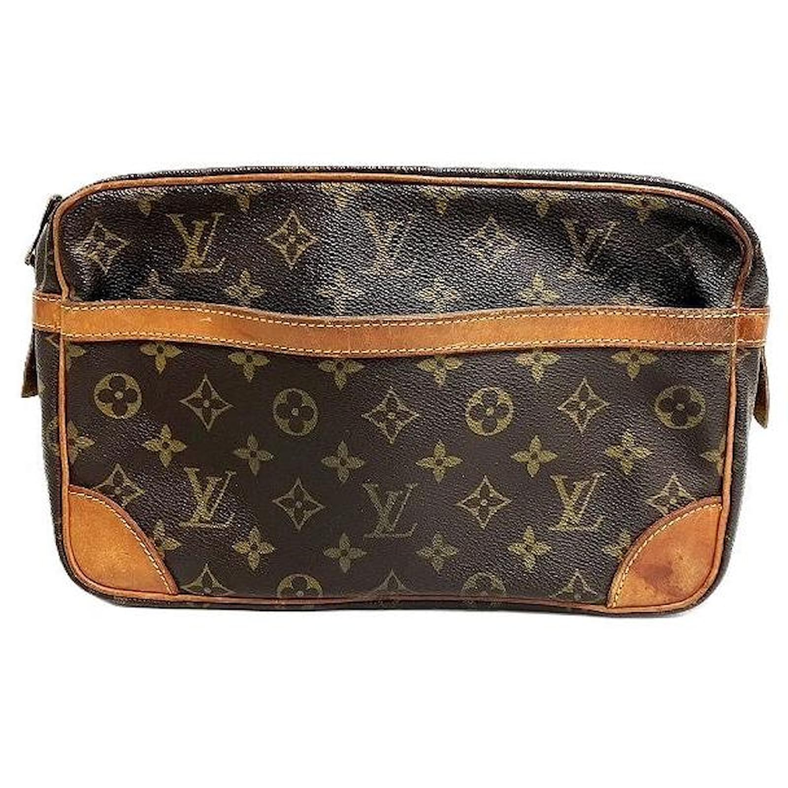 Louis Vuitton Compiegne Monogram clutch bag Brown Cloth  ref.2262430