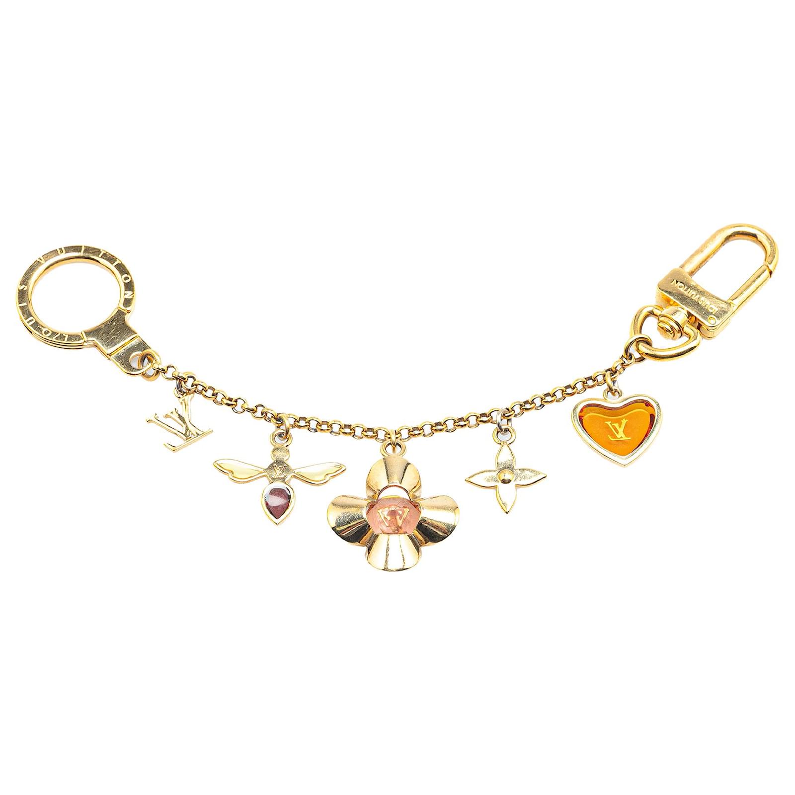 Louis Vuitton Gold Gold Plated Bee Flower Bag Charm Key Chain Golden Metal Gold-plated  ref.2293139