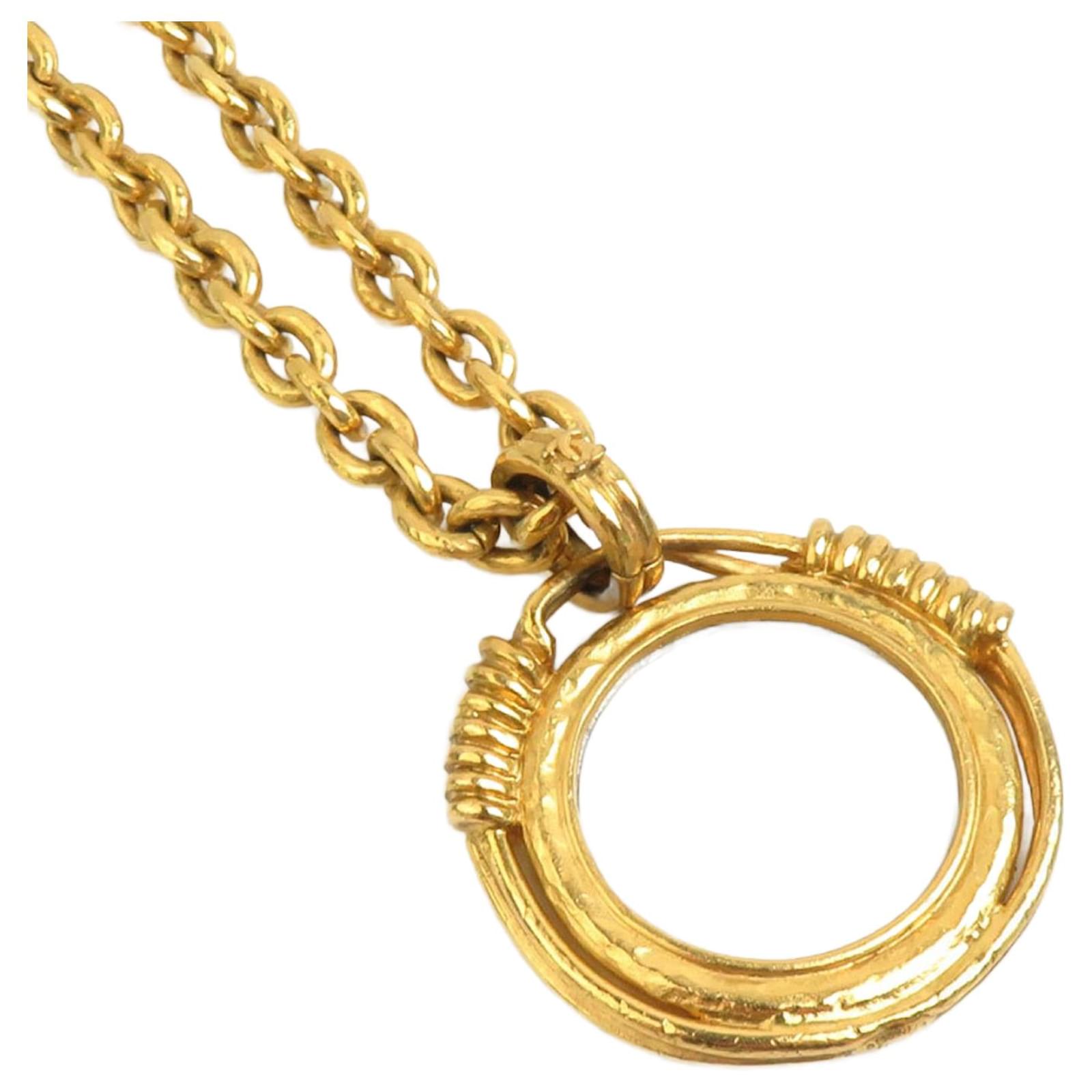 Chanel Gold Necklace with Magnifying Glass Pendant Golden Metal  ref.2300700