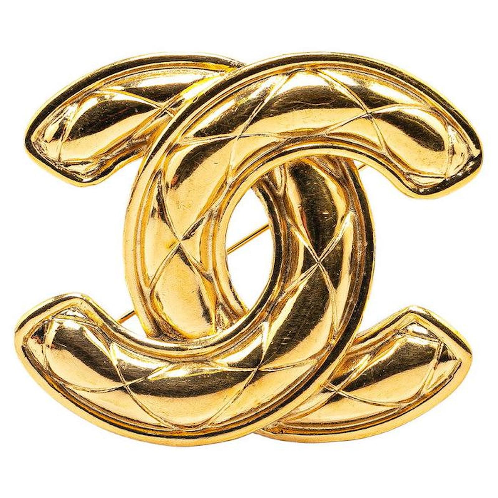 Chanel Gold Plated Matelassé Coco Mark Brooch Golden Metal  ref.1659396