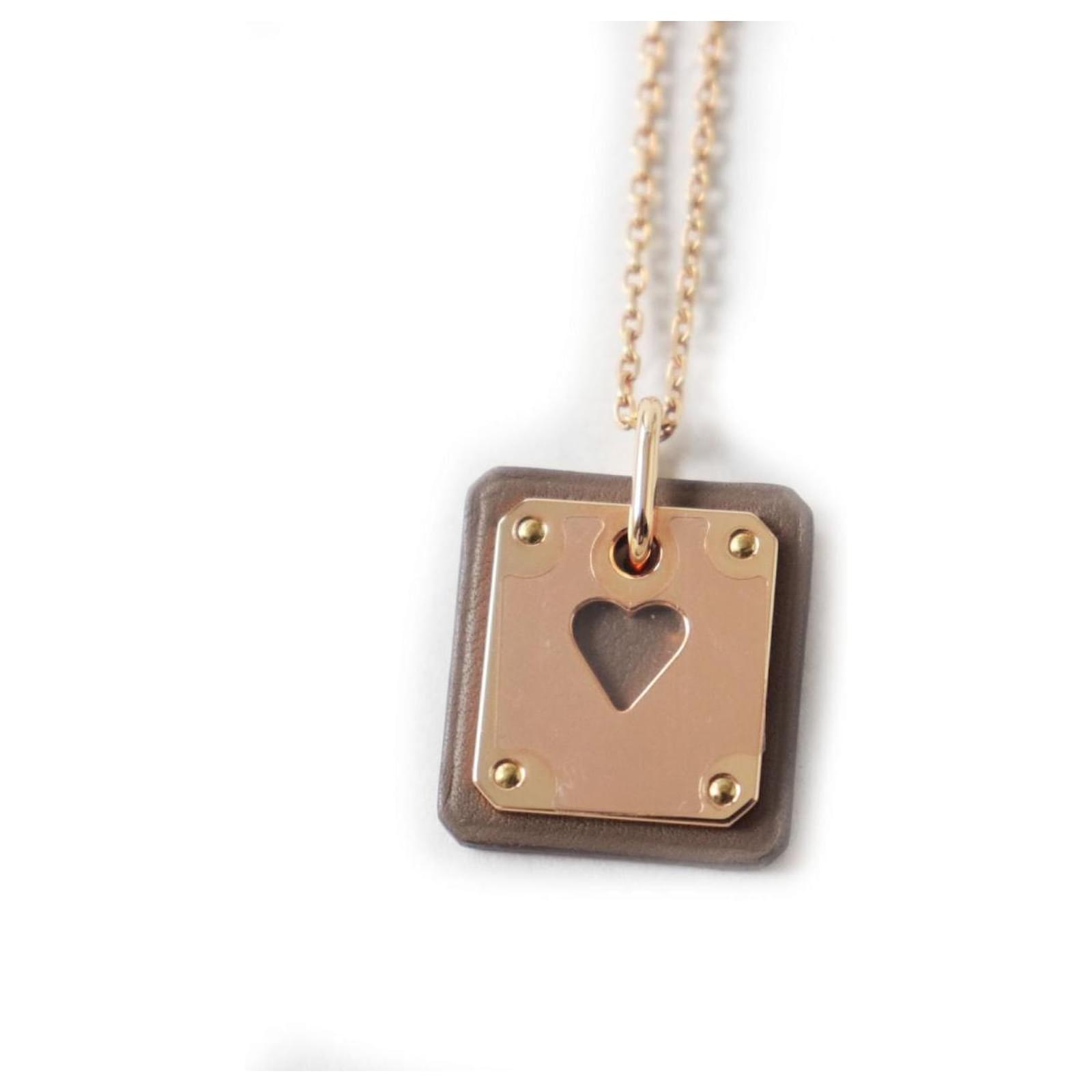 Hermès Hermes Asdecour Heart Pendant Necklace Pink Metal  ref.1688958